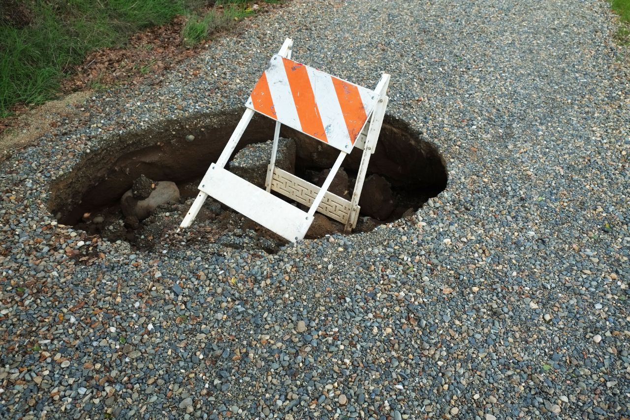 How Does a Sinkhole Form: Understanding the Earth’s Hidden Collapse